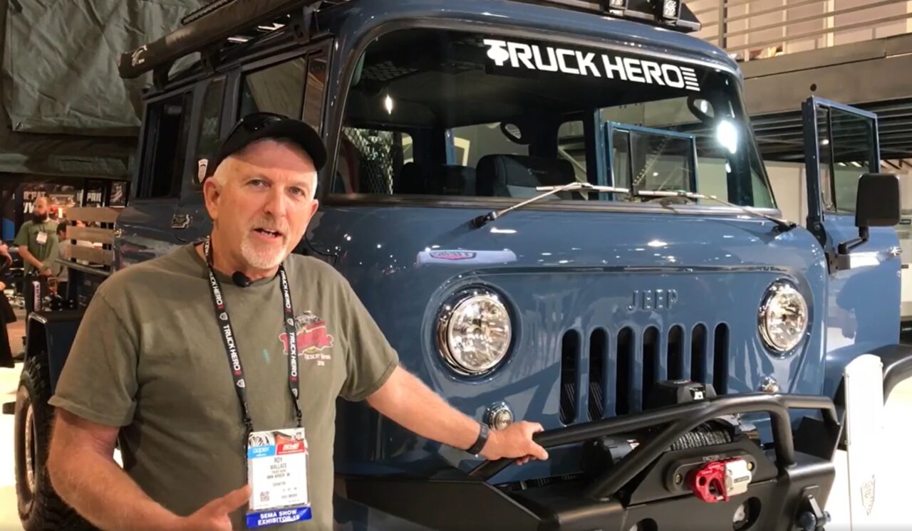 Roy Wallace and his Blue FC-170 talking to aFe Power at SEMA 2019