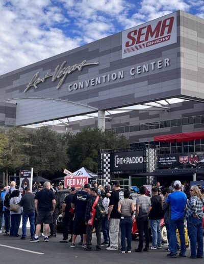 SEMA 2022 banner at busy Las Vegas Convention Center building entrance