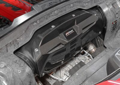 aFe POWER closed carbon fiber intake system installed under the hood of 2021 Chevy Corvette C8