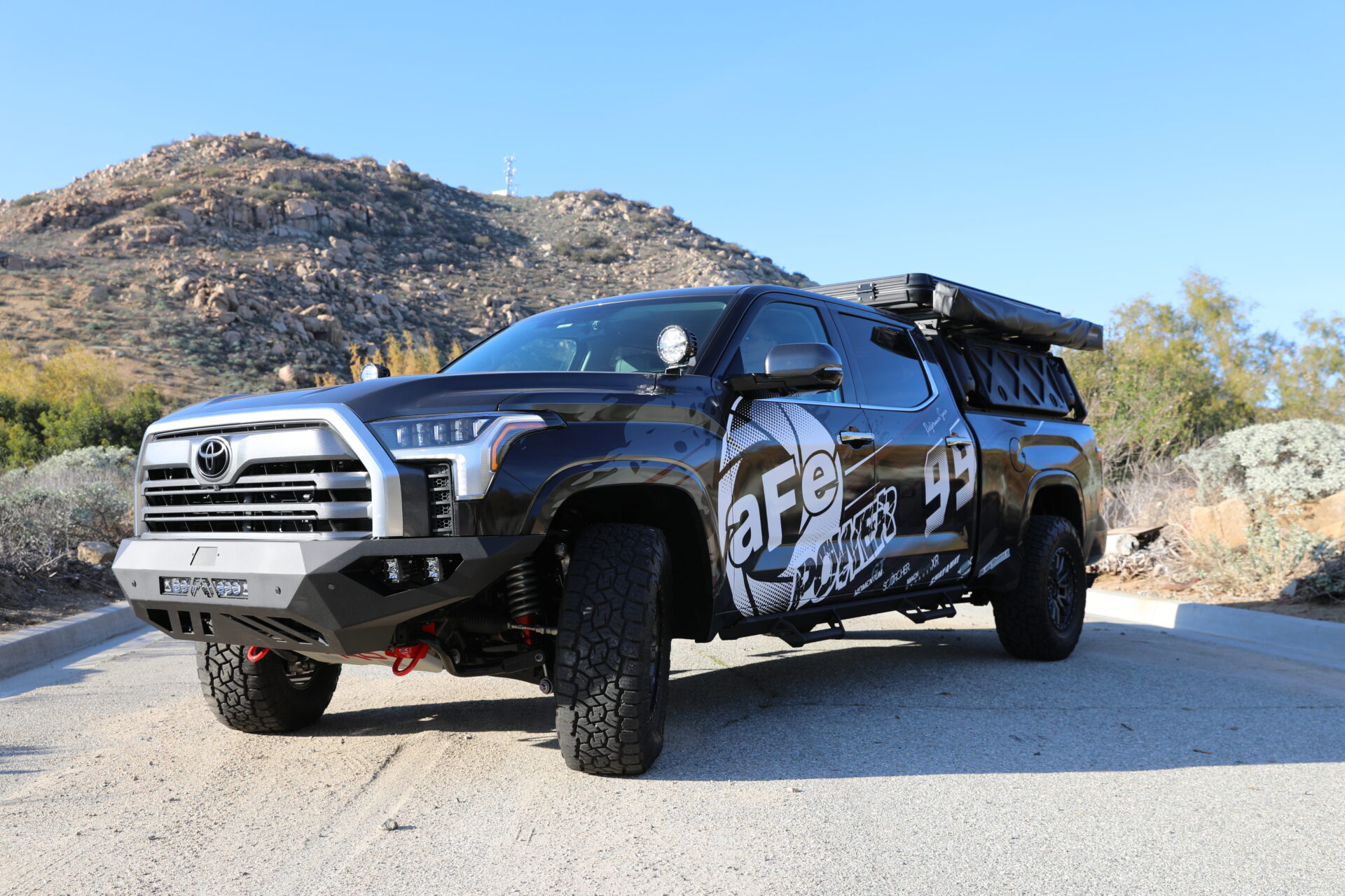 2022 Toyota Tundra with aFe POWER logo in desert