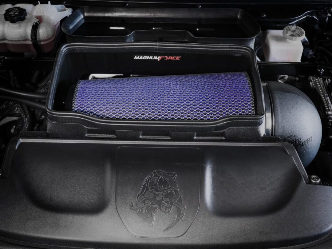 aFe massive 18-inch long blue conical filter with expanded metal in open air box showing TRX easter egg installed on 2022 RAM 1500 TRX engine