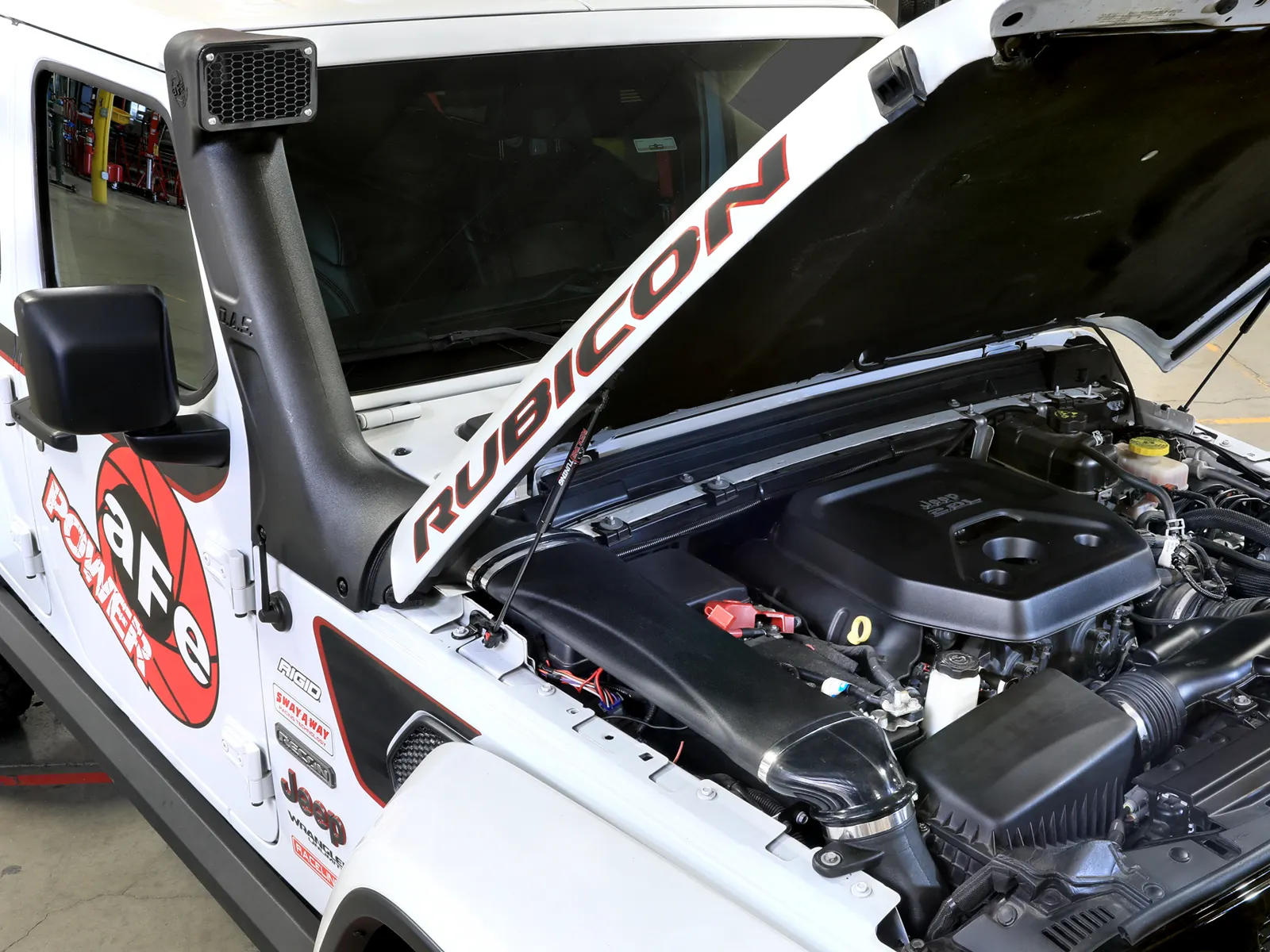 AFE Snorkel on White AFE Jeep with hood open connecting to AFE intake system