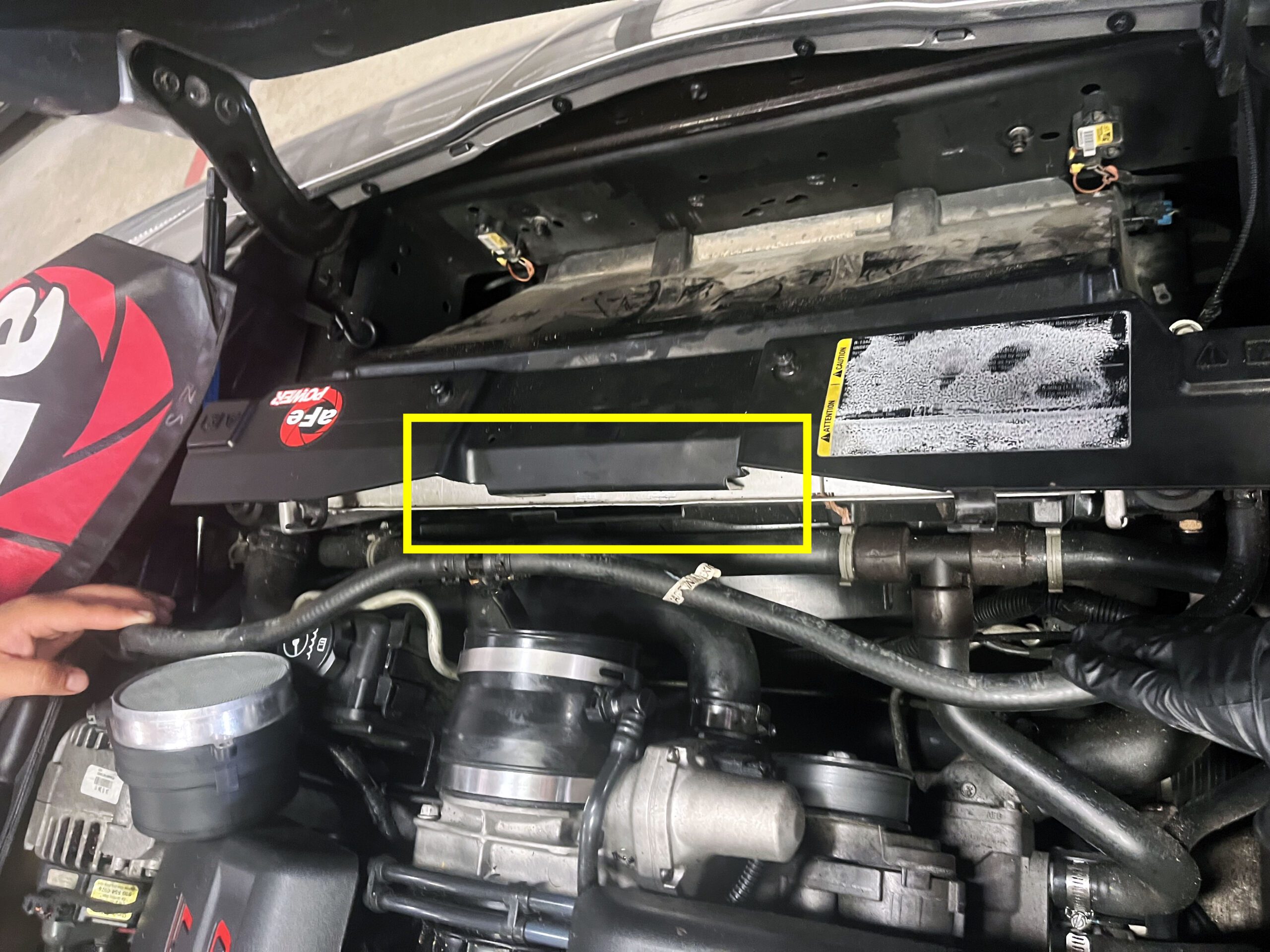 Corvette C6 plastic radiator cover in incorrect position pushing aFe intake causing hood not to close 