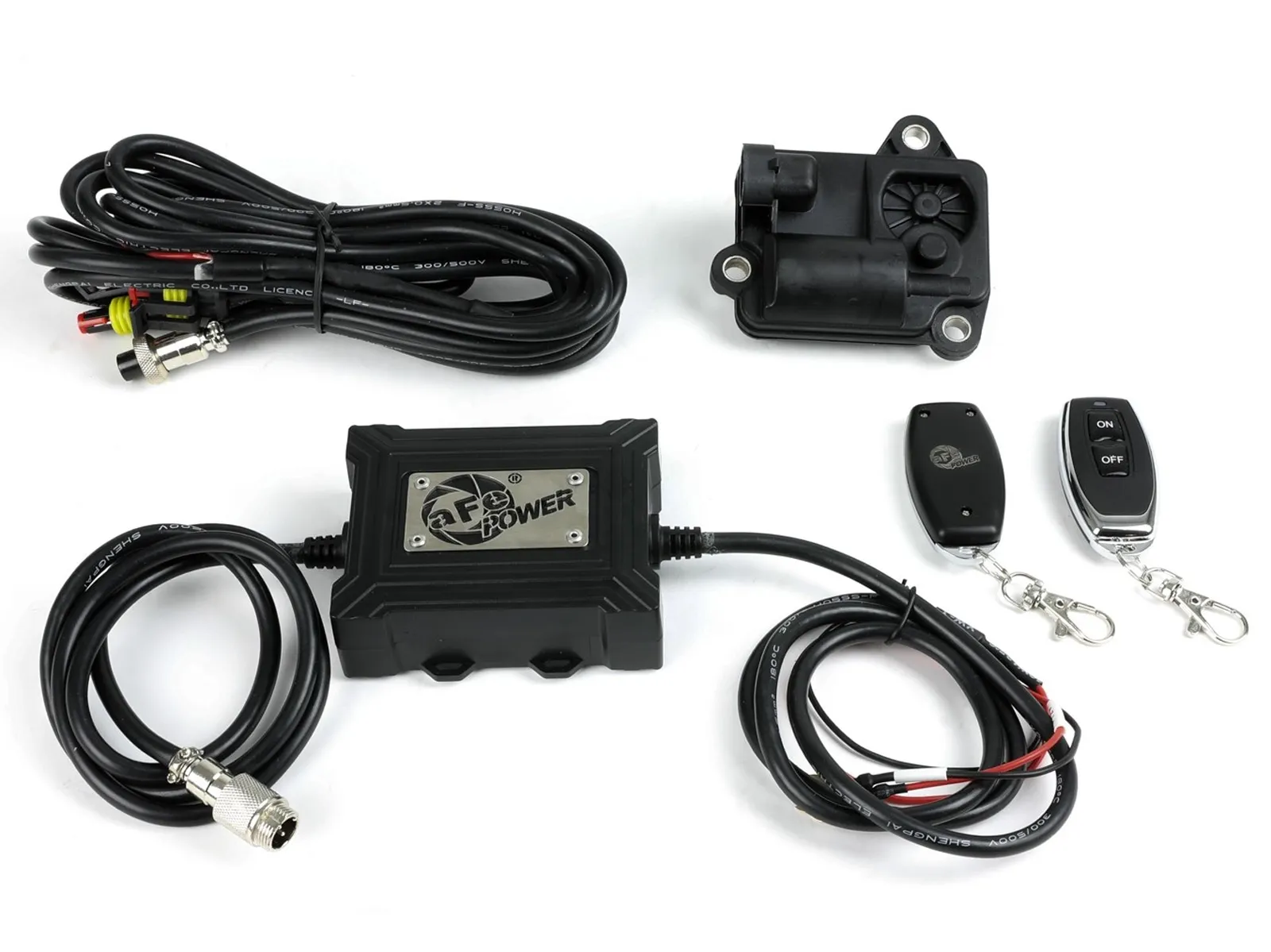 aFe wires, electronically-controlled exhaust valve, and key fob remote on white background