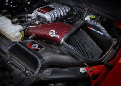 Red Kevlar Tube on aFe Track Series open intake with matching Raptor R red dot emblem on F-150 Raptor R