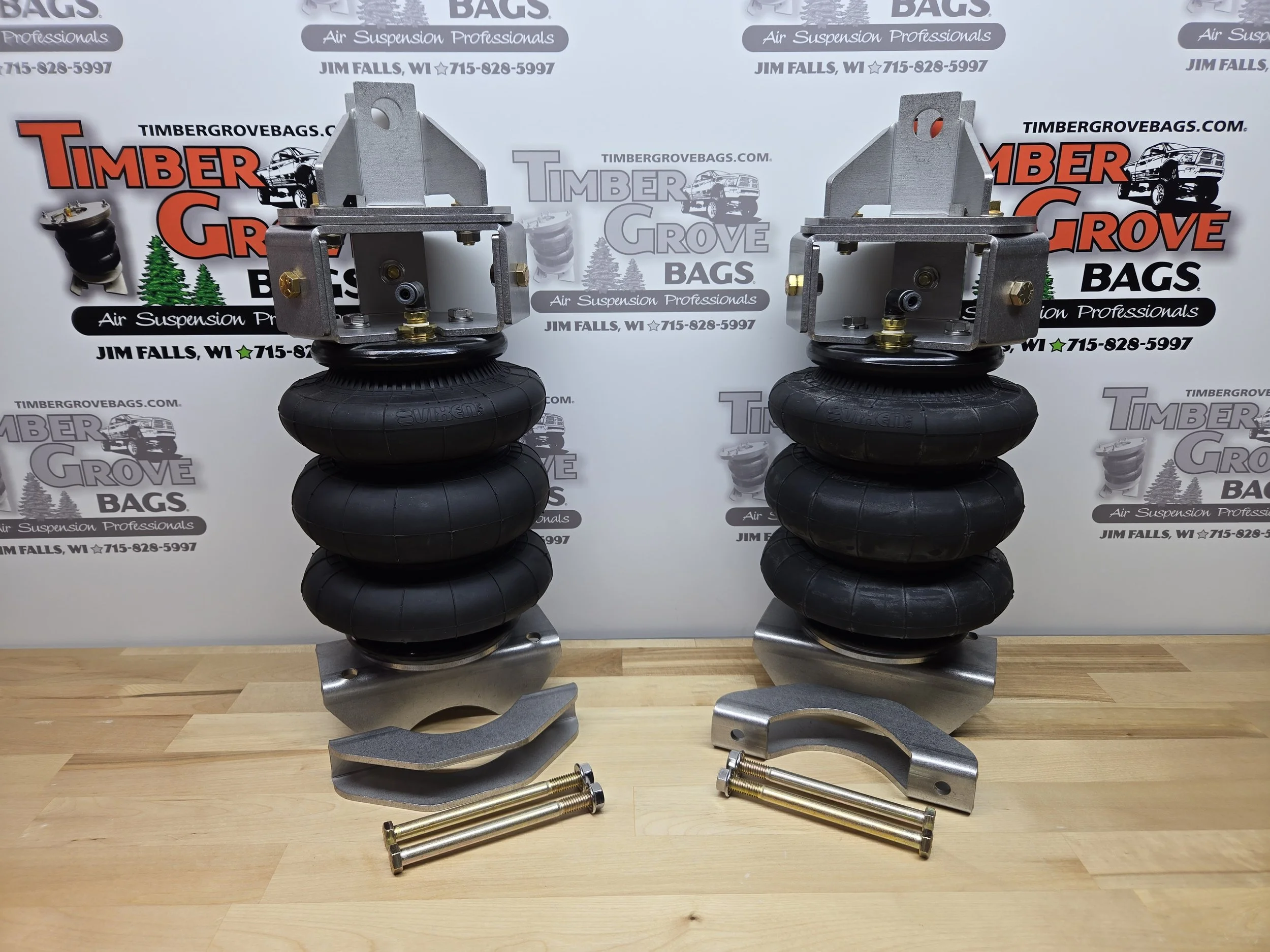 ram-rho-trx-air-suspension Two Ram 1500 air spring kits on table with Timer Grove Enterprises background
