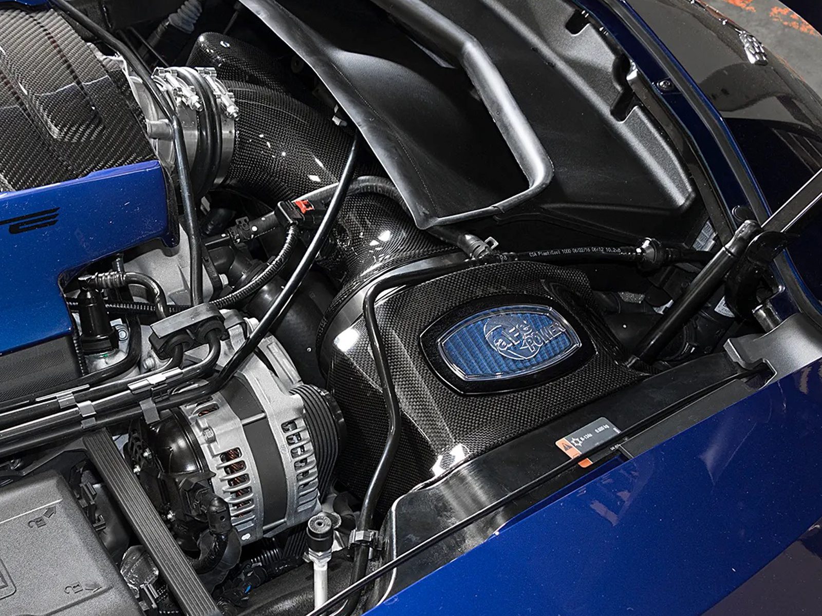 aFe POWEOR Carbon Fiber Cold Air Intake installed on blue Corvette C7 