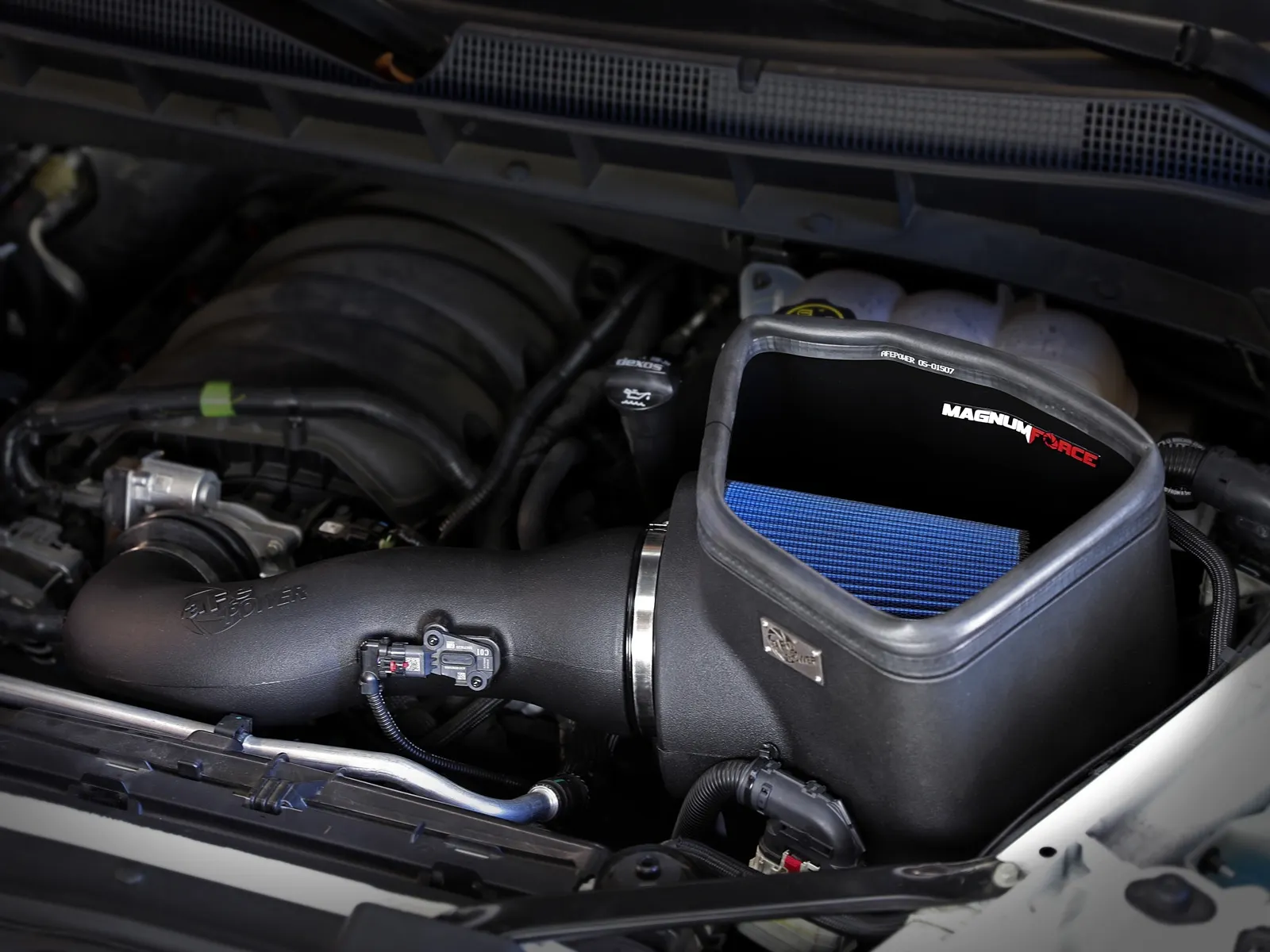 aFe Open-style Magnum Force Air Intake with blue air filter installed in V8 6.2L GMC Sierra 1500/Chevy Silverado 1500