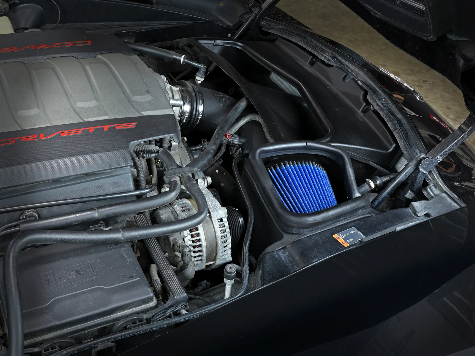 aFe Magnum Force Stage 2 open style air intake with blue air filter installed in Corvette C7