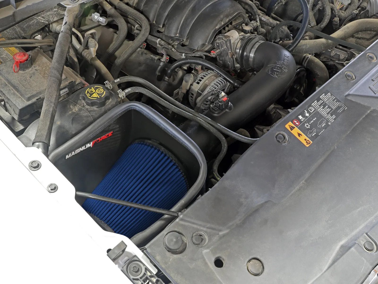 Open style Magnum Force Stage 2 Air Intake with blue filter installed on Chevy Silverado 1500/GMC Sierra 1500 V8