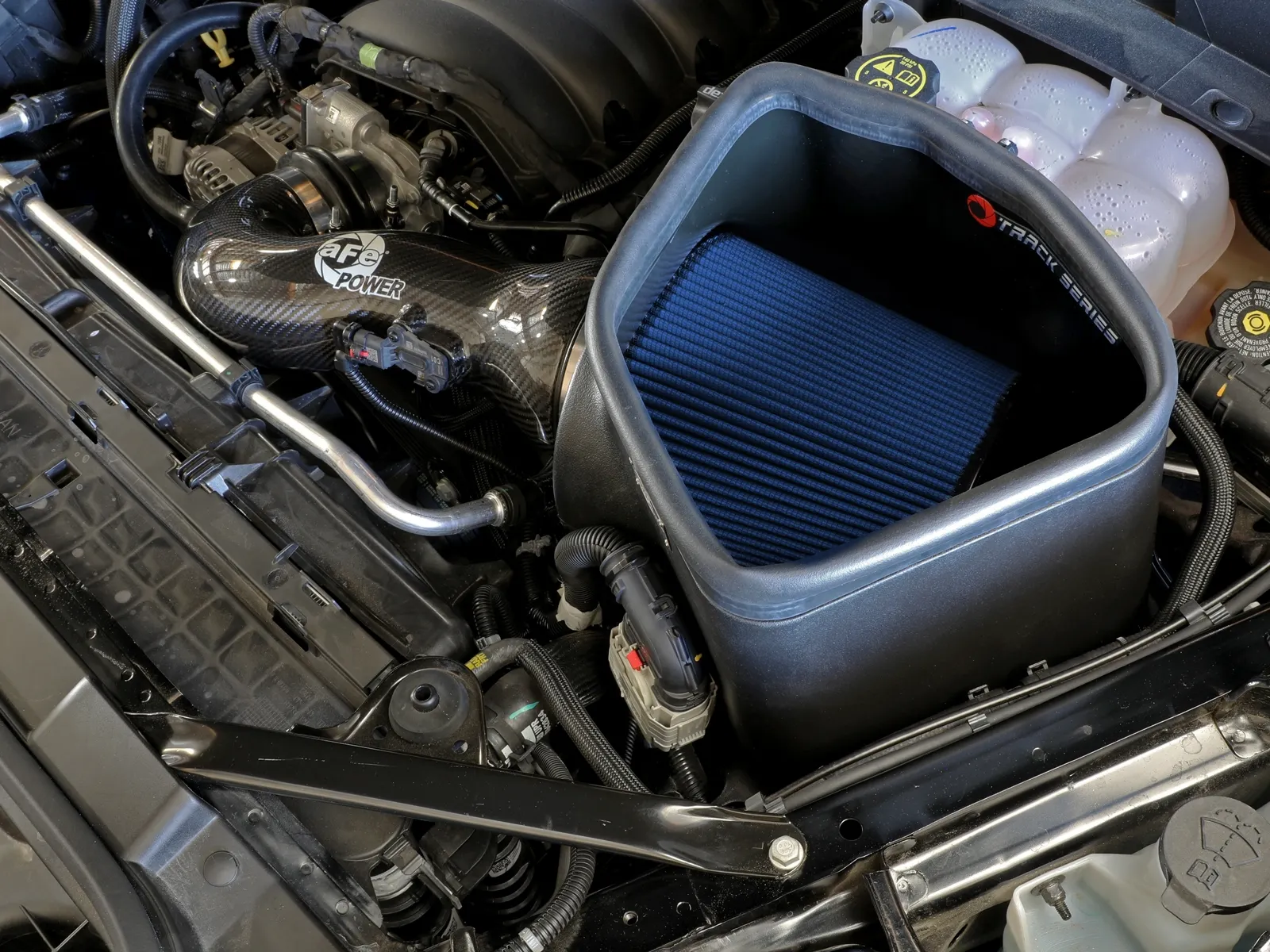 aFe Intake with blue air filter and Carbon Fiber tube installed in V8 Chevy and GMC Trucks