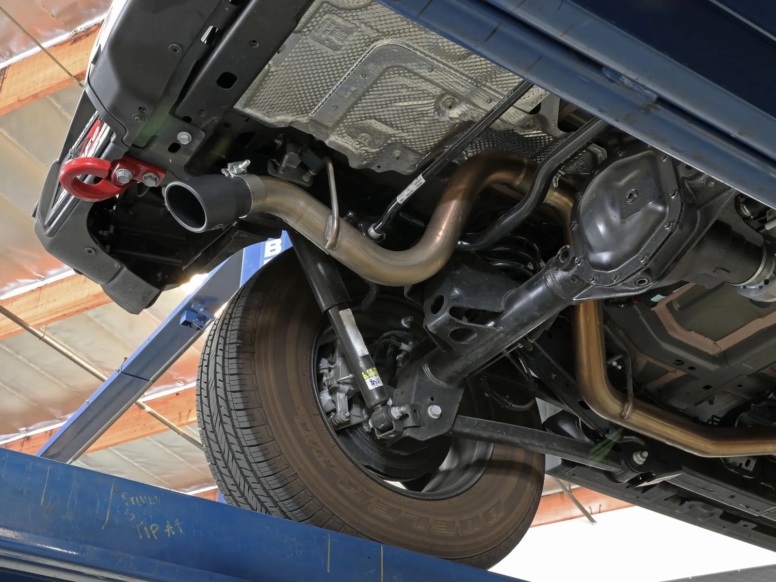 Undershot of High clearance aFe off-road exhaust on Jeep Wrangler JL