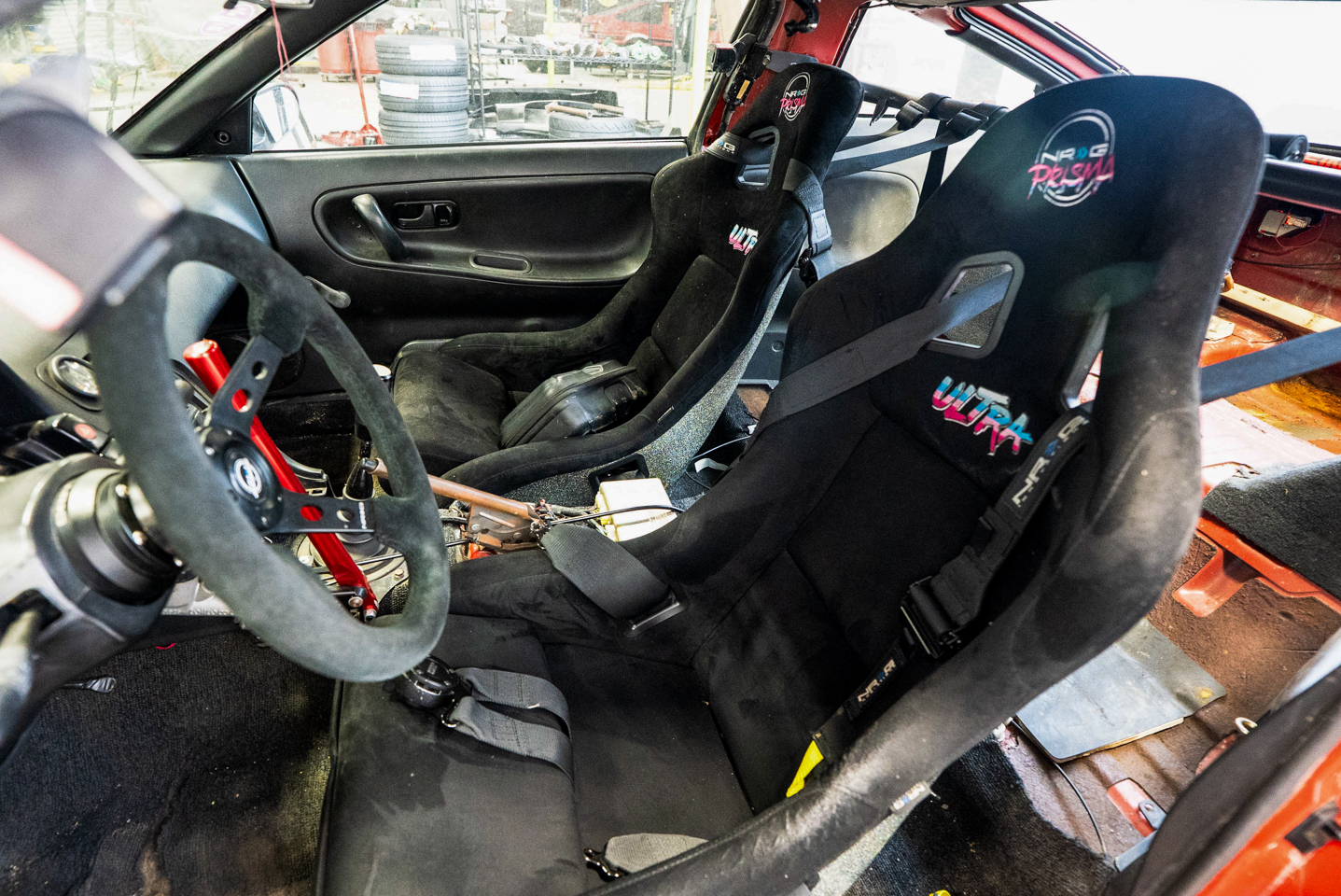 Nissan 240SX drift car interior before with NRG Prisma seats
