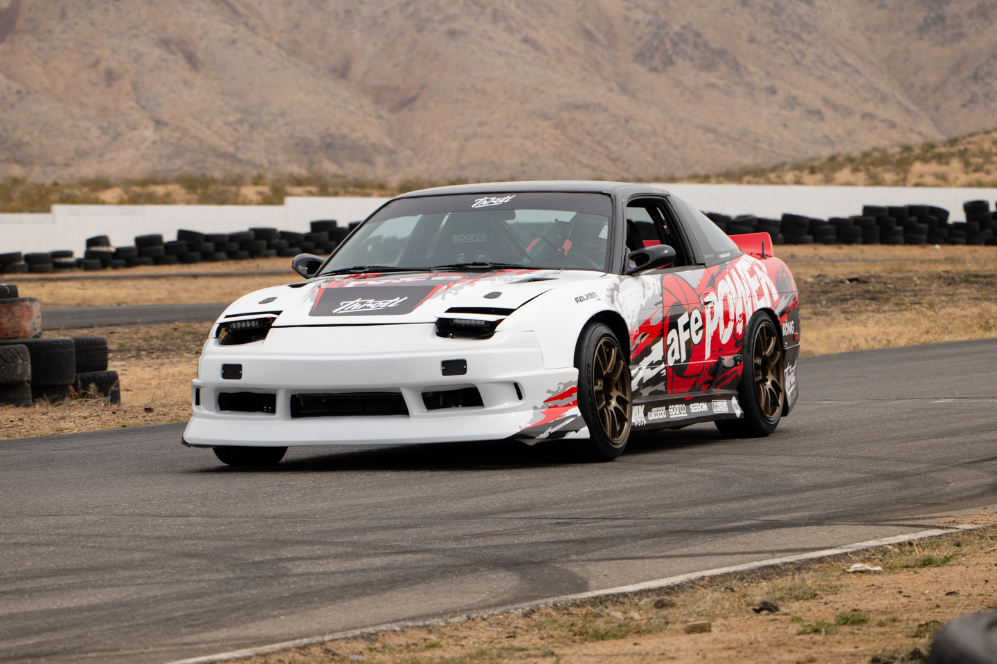 Nissan 240SX driving on Apple Valley Raceway track