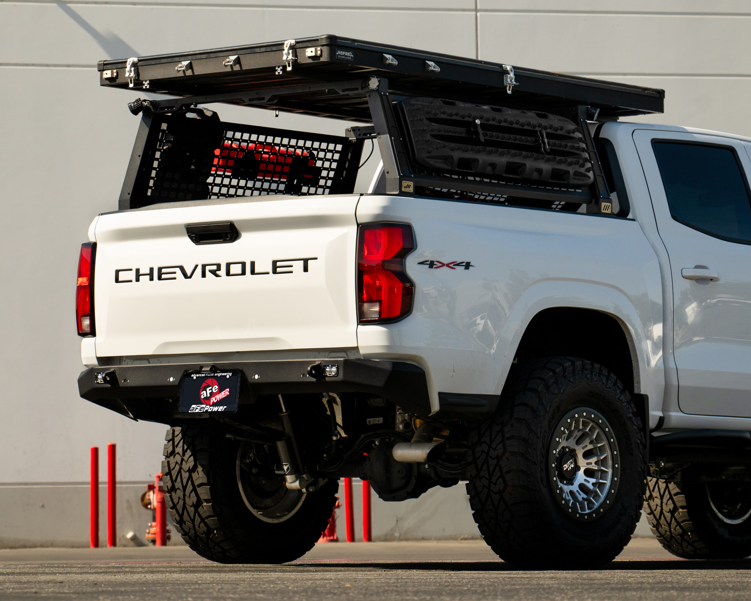 White Chevy Colorado truck bed and racking