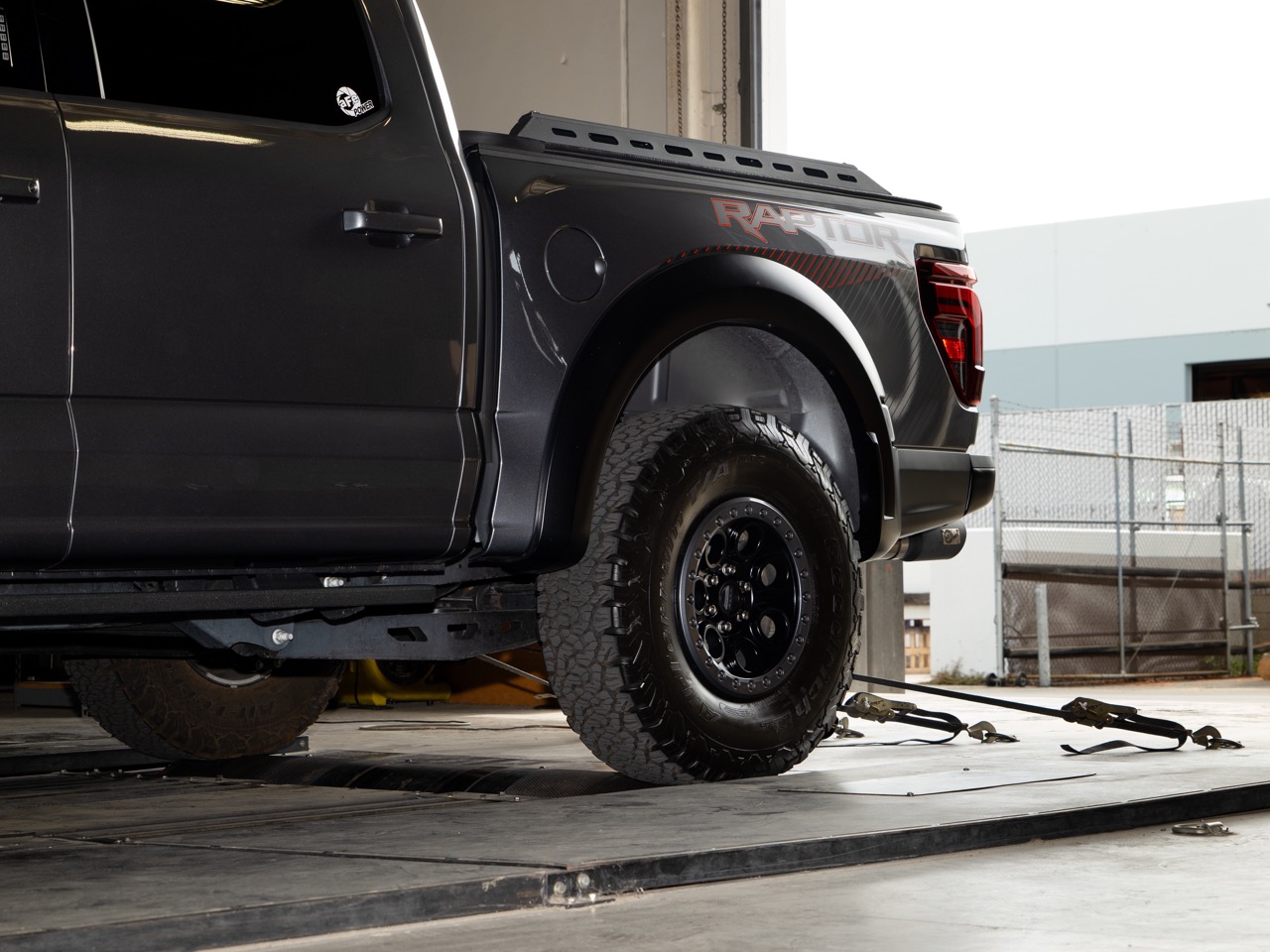 Rear of Ford F-150 Raptor strapped to a dyno